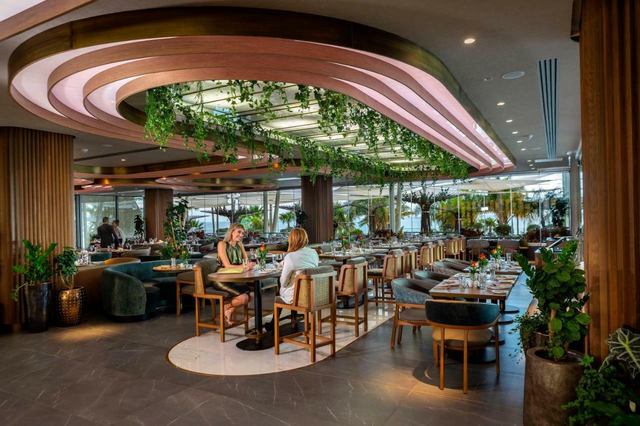 아마투스 비치 호텔 리마솔 레메소스 외부 사진 The interior of the restaurant